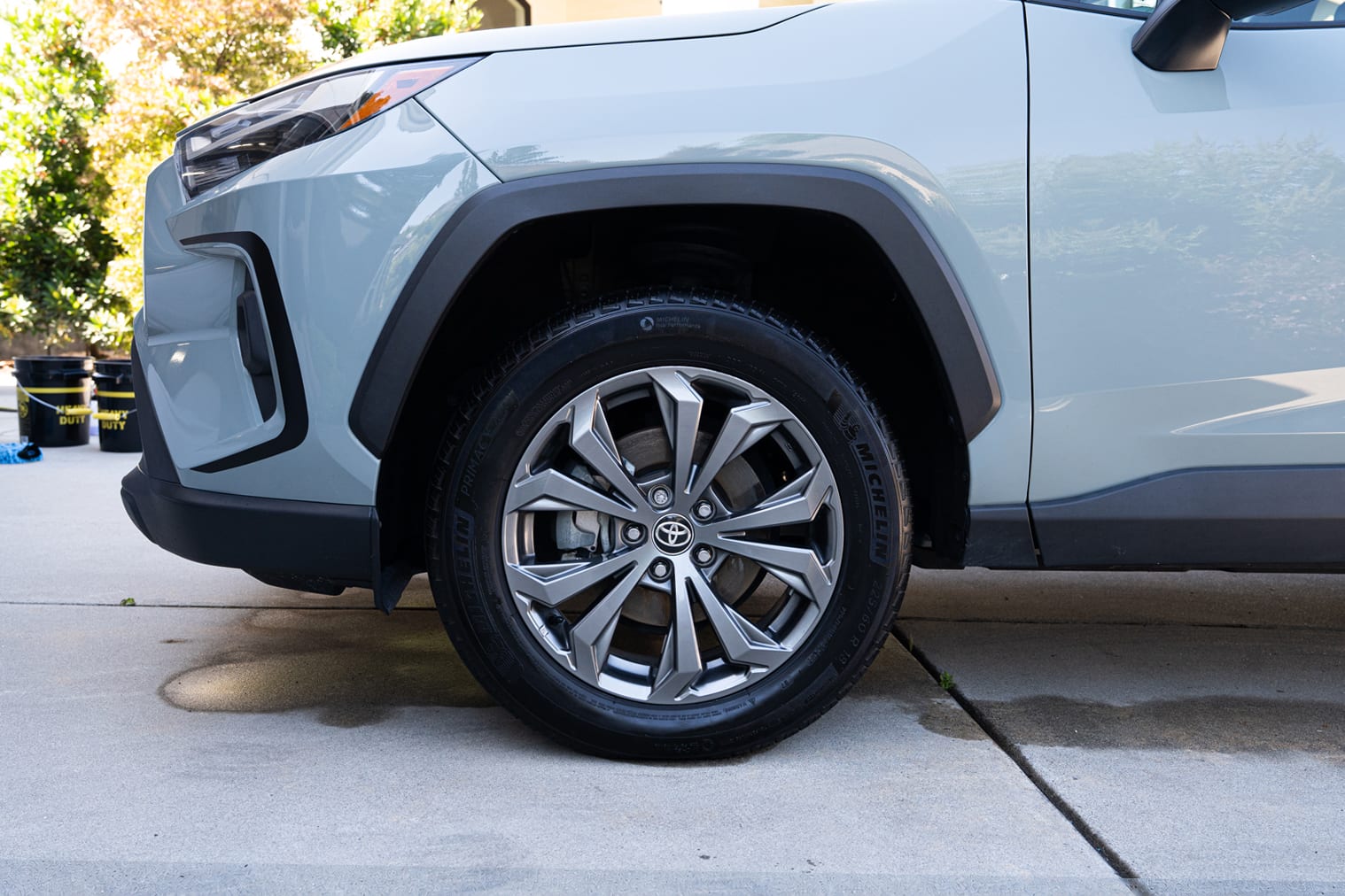 Clean, dressed tire and polished wheel after detailing