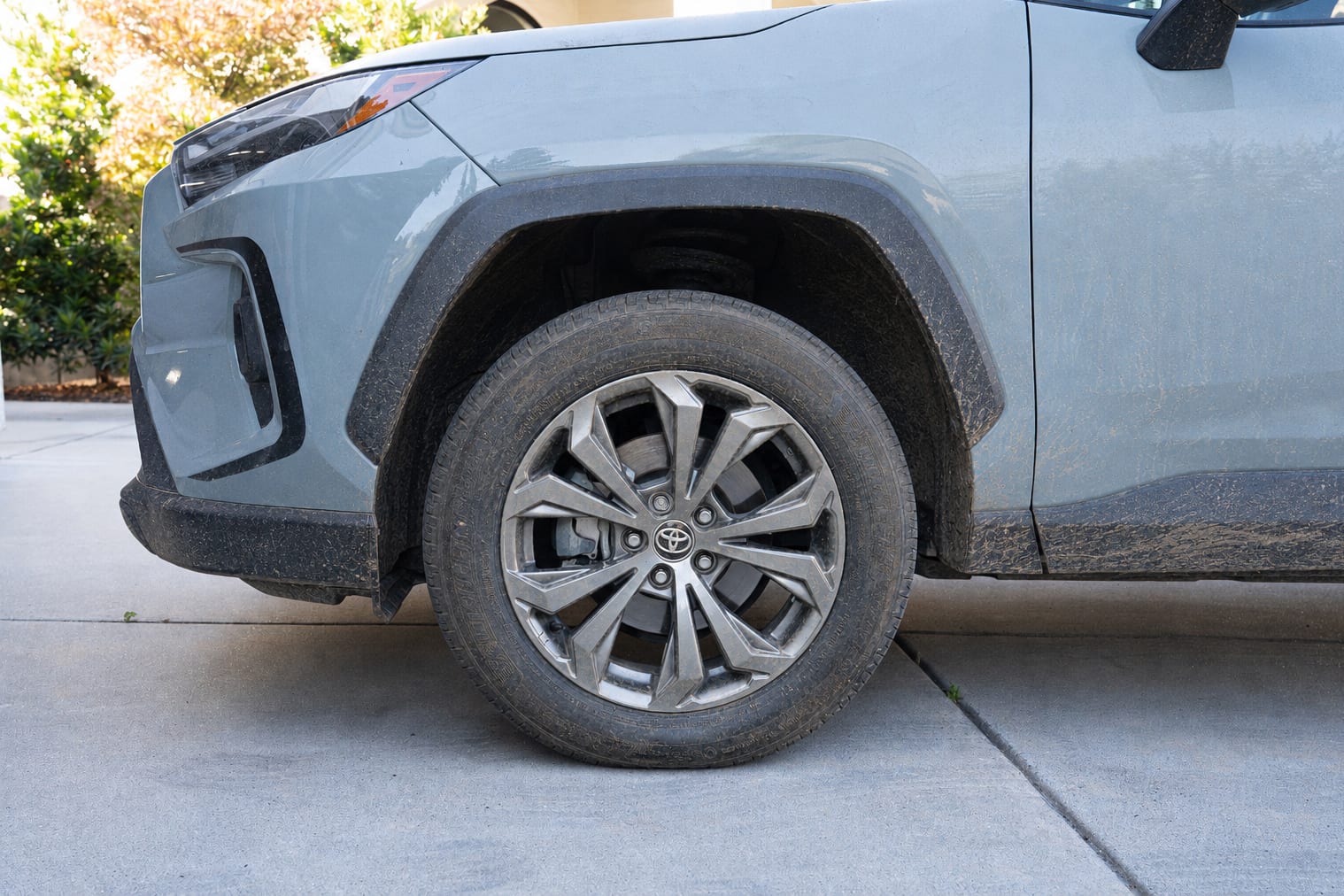 Dirty tire and wheel before detailing